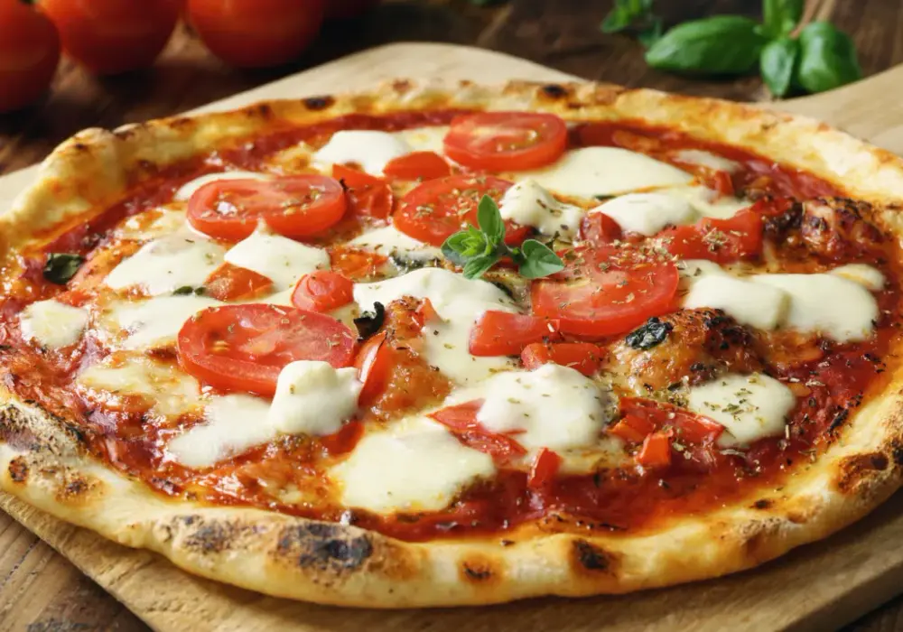 Kiedy powstała pizza? Historia włoskiego przysmaku od A do Z