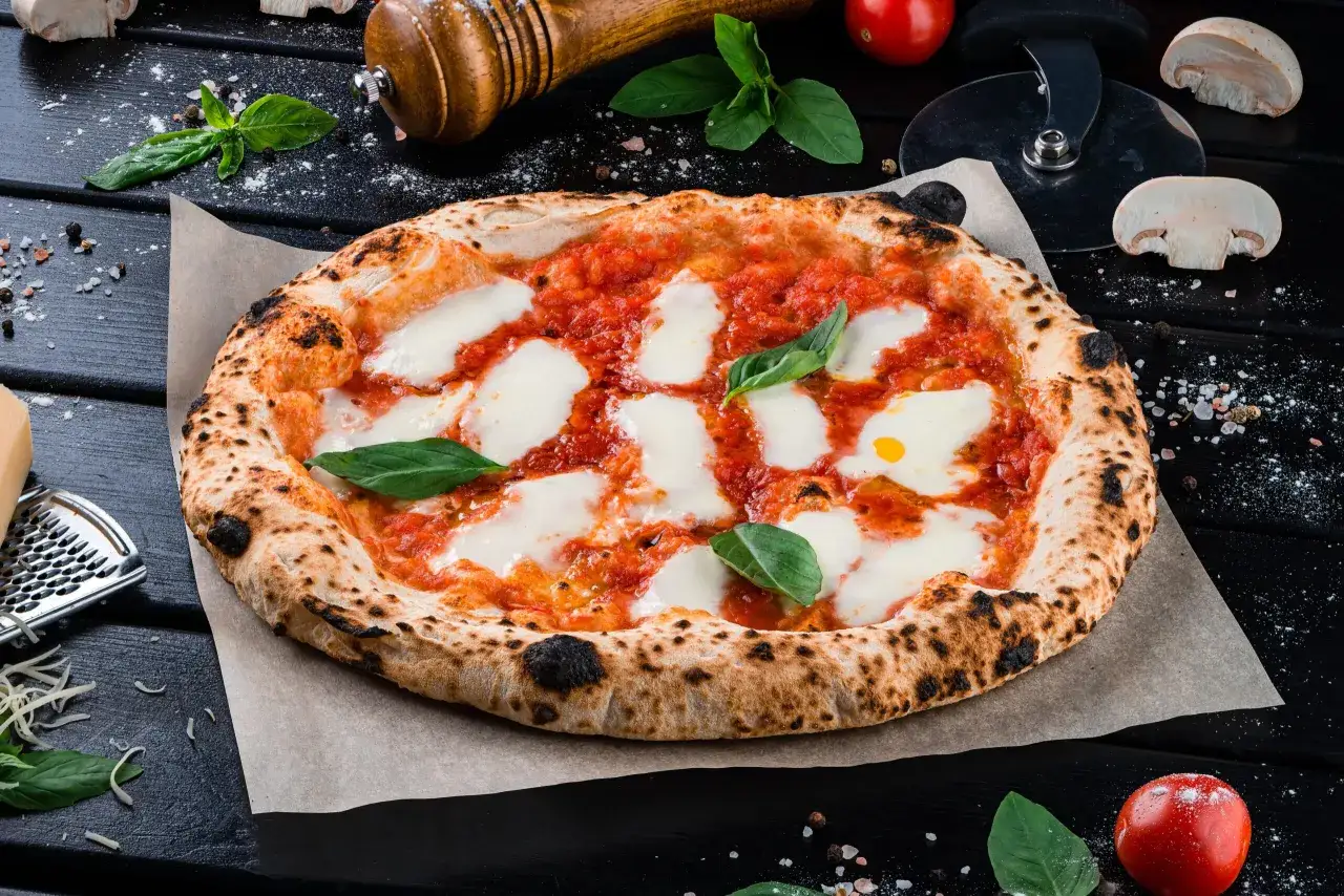 Zdjęcie Skąd jest pizza? Odkryj fascynującą historię jej pochodzenia